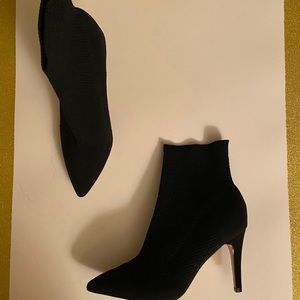 Black Perforated Sock Booties
Size 9 us